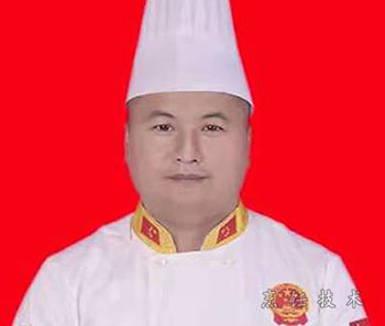 薛国明